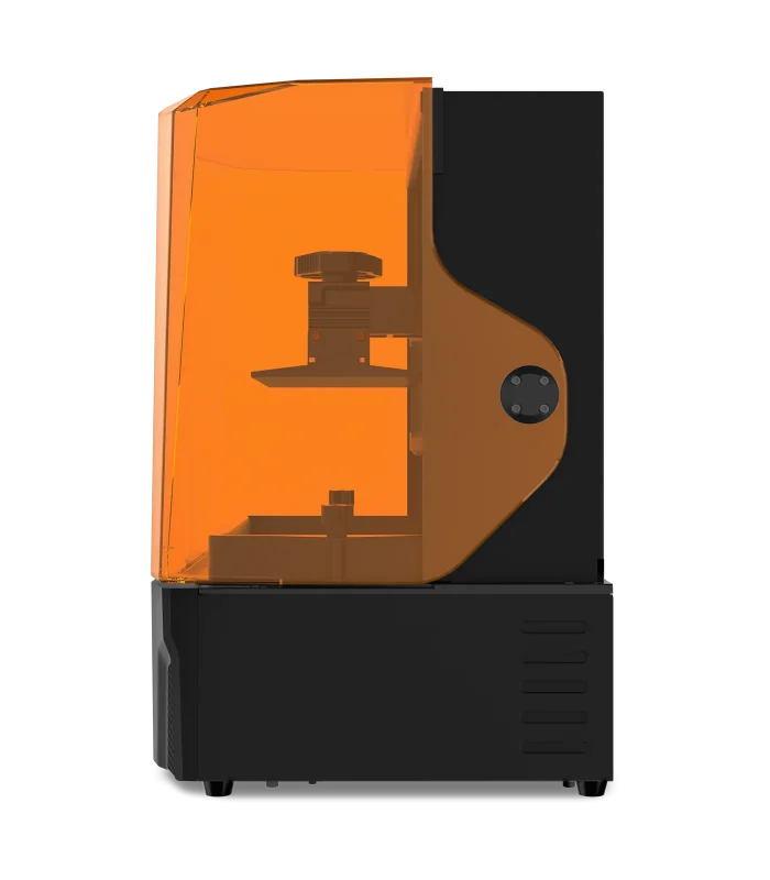 Side view of a desktop 3D printer with an orange transparent enclosure on the left and a black base on the right.